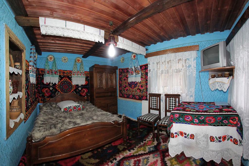 Pensiunea Sub Cetate La Matei Onceşti Quarto foto
