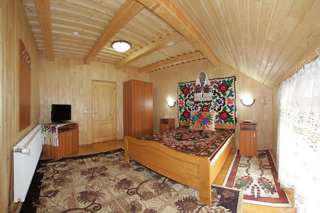 Pensiunea Sub Cetate La Matei Onceşti Quarto foto