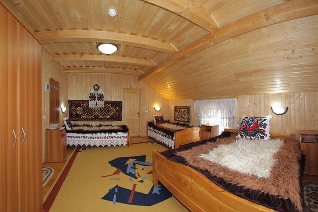 Pensiunea Sub Cetate La Matei Onceşti Quarto foto